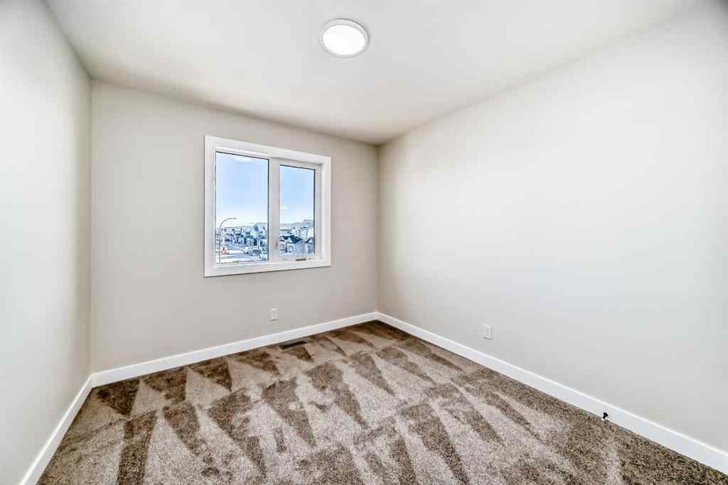 MLS® A2268036 - 1001 Reynolds Crescent SW in Coopers Crossing Airdrie, Residential