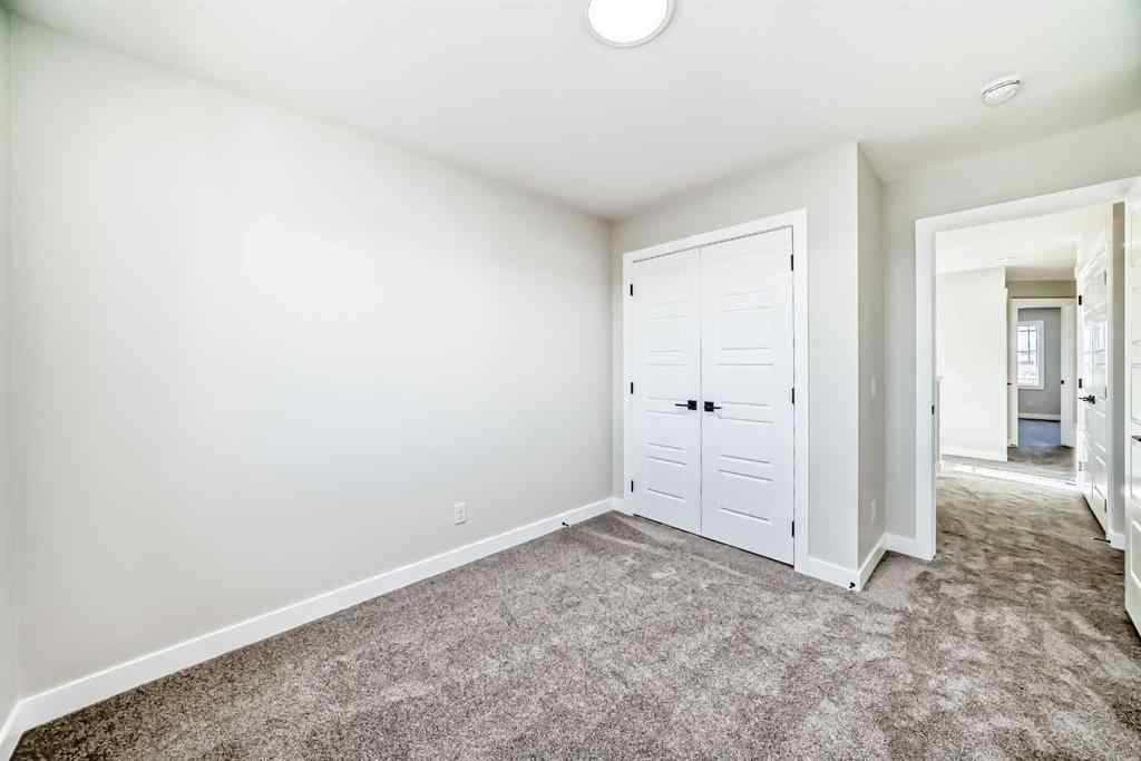 MLS® A2268036 - 1001 Reynolds Crescent SW in Coopers Crossing Airdrie, Residential