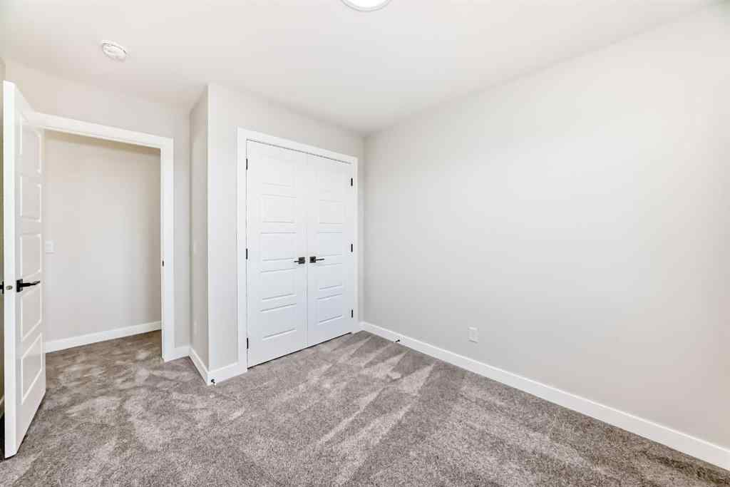 MLS® A2268036 - 1001 Reynolds Crescent SW in Coopers Crossing Airdrie, Residential