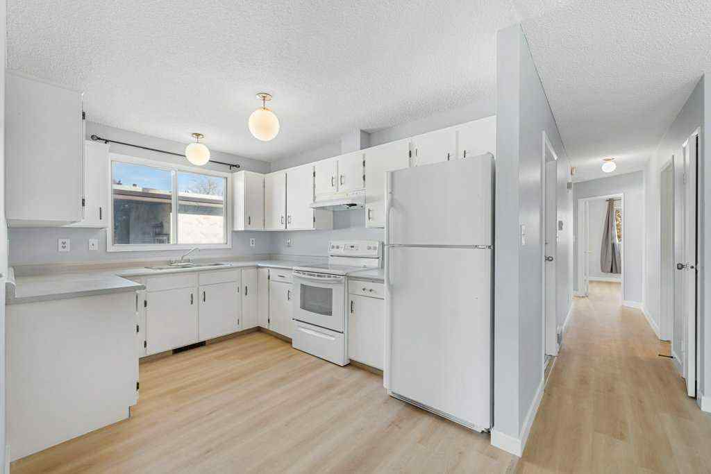 MLS® A2268038 - 53,55 Dovercliffe Way SE in Dover Calgary, Residential
