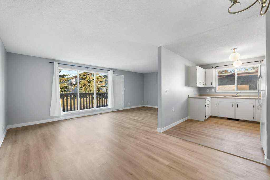 MLS® A2268038 - 53,55 Dovercliffe Way SE in Dover Calgary, Residential