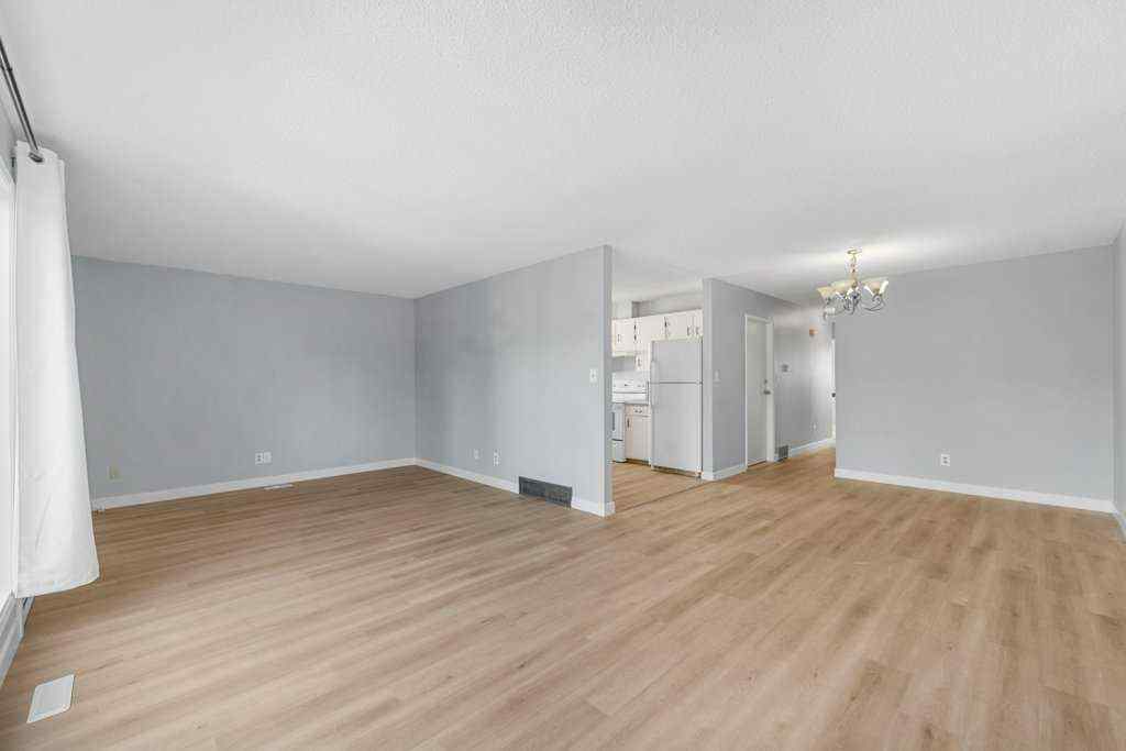 MLS® A2268038 - 53,55 Dovercliffe Way SE in Dover Calgary, Residential