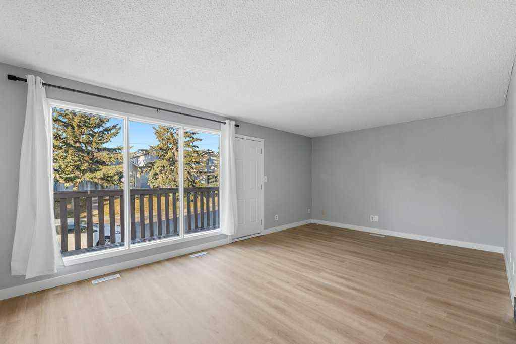 MLS® A2268038 - 53,55 Dovercliffe Way SE in Dover Calgary, Residential