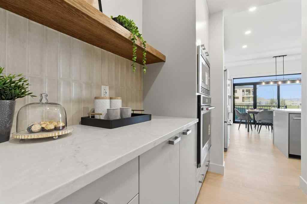 MLS® A2268052 - 11 Rowmont Gardens NW in Haskayne Calgary, Residential