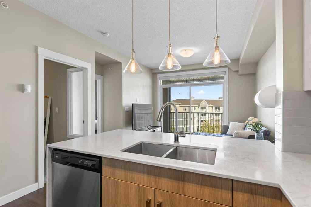 MLS® A2268060 - Unit #417 110 Auburn Meadows View SE in Auburn Bay Calgary, Residential