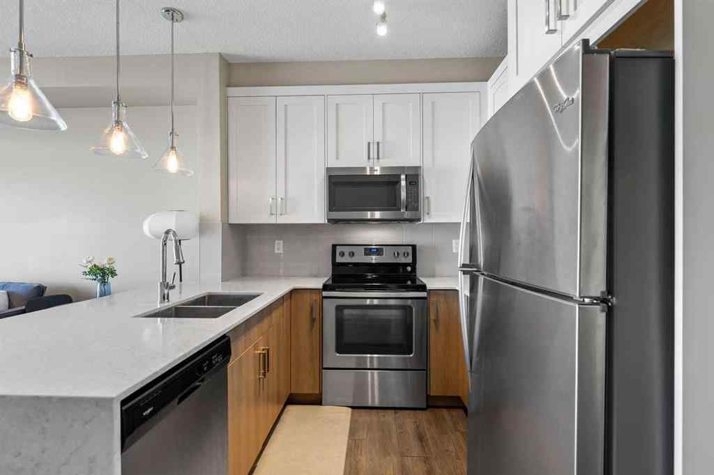 MLS® A2268060 - Unit #417 110 Auburn Meadows View SE in Auburn Bay Calgary, Residential