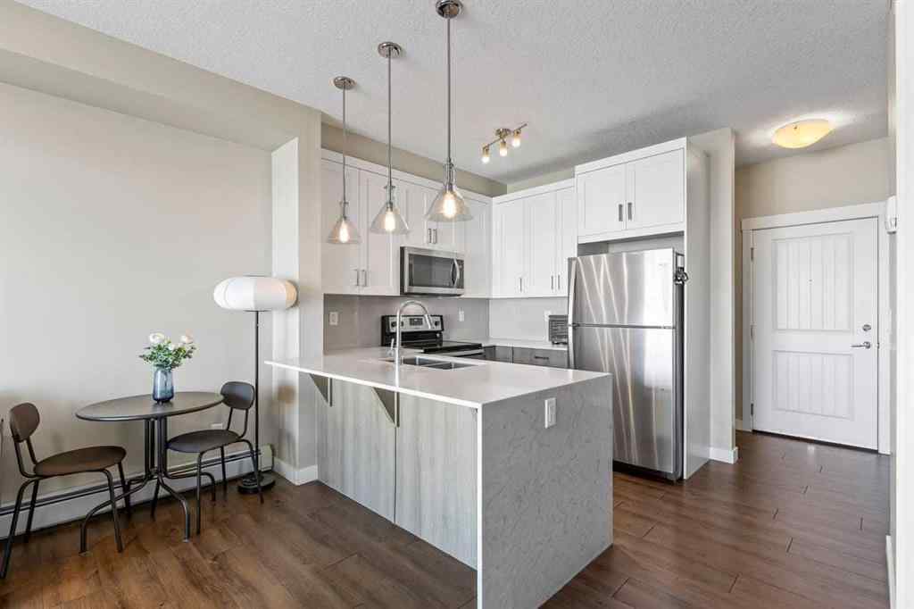 MLS® A2268060 - Unit #417 110 Auburn Meadows View SE in Auburn Bay Calgary, Residential