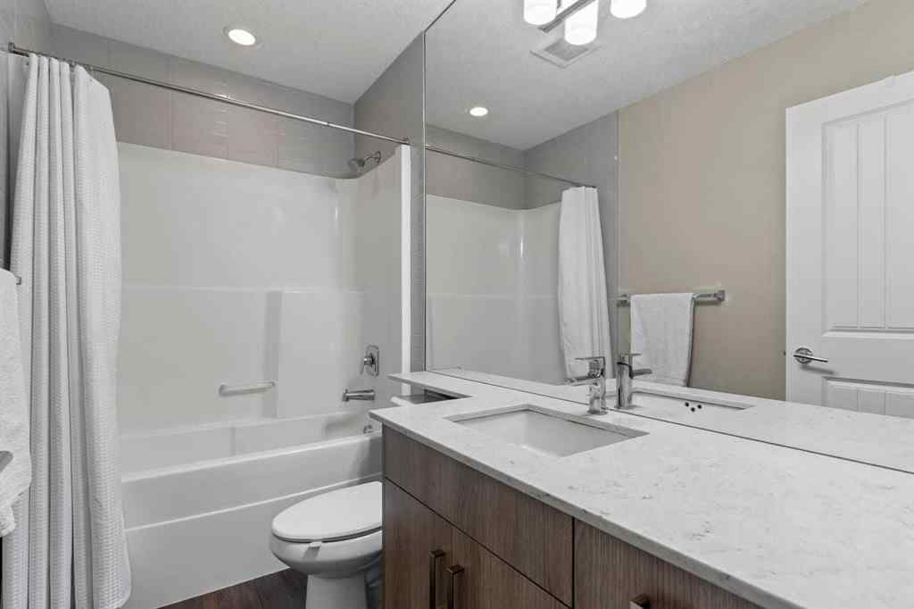 MLS® A2268060 - Unit #417 110 Auburn Meadows View SE in Auburn Bay Calgary, Residential