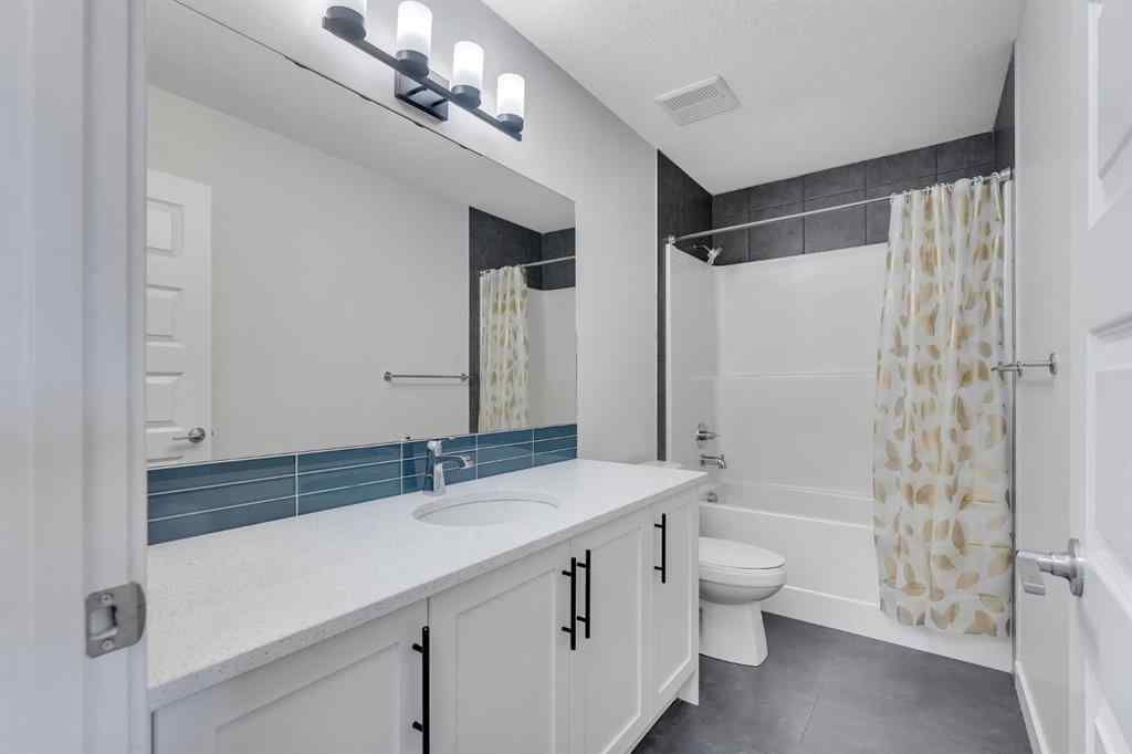 MLS® A2268070 - 1489 Bayview Point SW in Bayview Airdrie, Residential