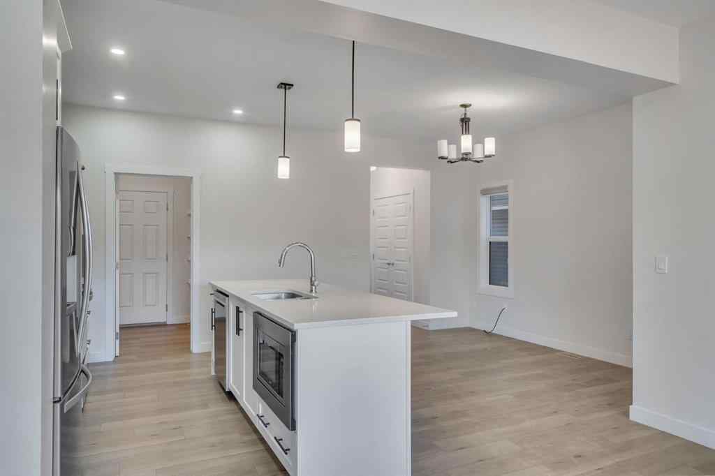 MLS® A2268070 - 1489 Bayview Point SW in Bayview Airdrie, Residential