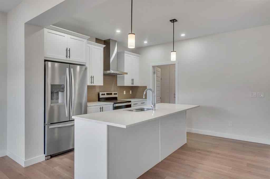 MLS® A2268070 - 1489 Bayview Point SW in Bayview Airdrie, Residential