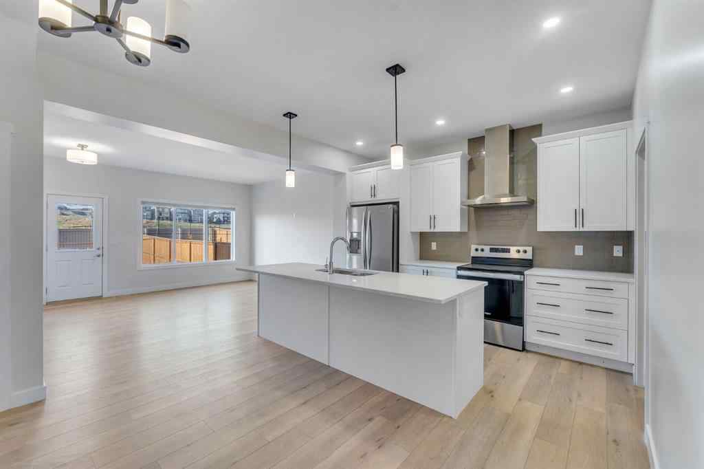 MLS® A2268070 - 1489 Bayview Point SW in Bayview Airdrie, Residential