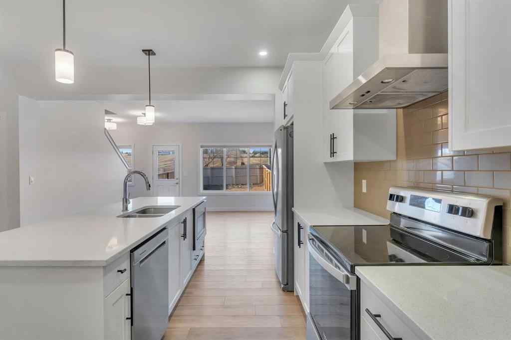 MLS® A2268070 - 1489 Bayview Point SW in Bayview Airdrie, Residential