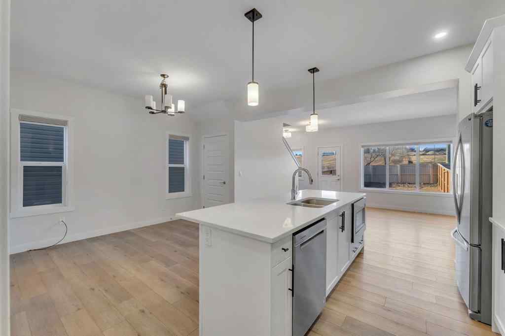 MLS® A2268070 - 1489 Bayview Point SW in Bayview Airdrie, Residential