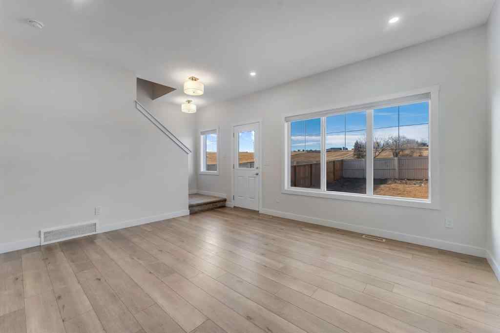 MLS® A2268070 - 1489 Bayview Point SW in Bayview Airdrie, Residential