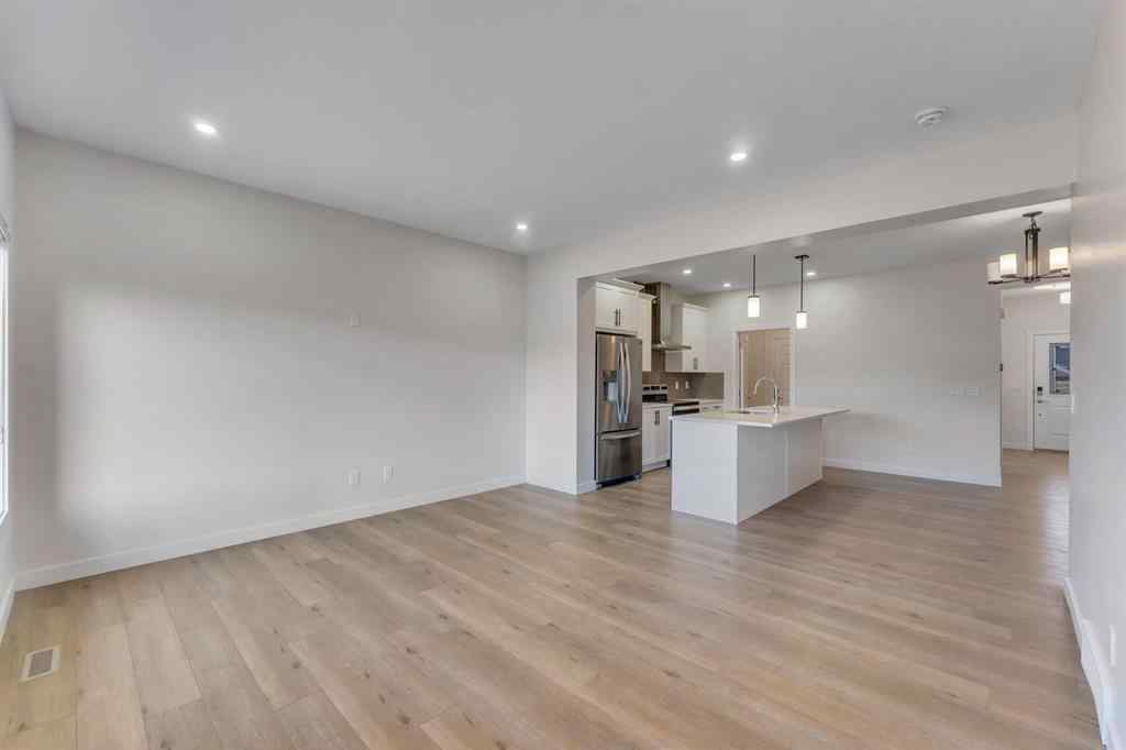 MLS® A2268070 - 1489 Bayview Point SW in Bayview Airdrie, Residential