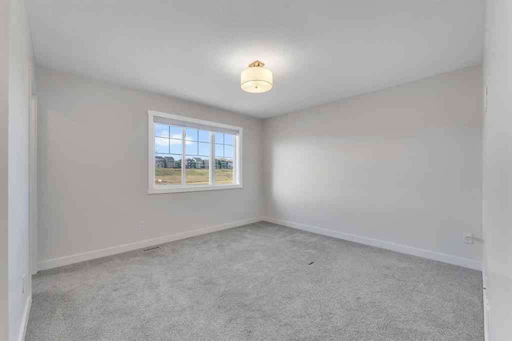 MLS® A2268070 - 1489 Bayview Point SW in Bayview Airdrie, Residential