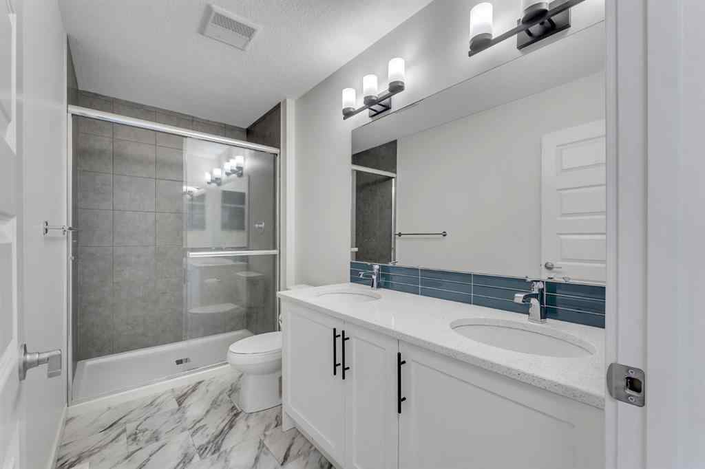 MLS® A2268070 - 1489 Bayview Point SW in Bayview Airdrie, Residential