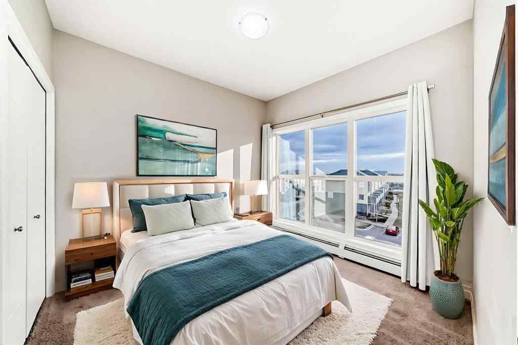 MLS® A2268077 - Unit #415 402 Marquis Lane SE in Mahogany Calgary, Residential