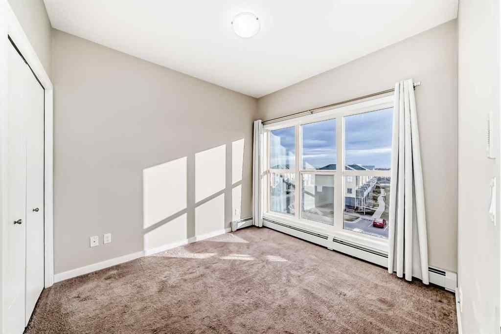 MLS® A2268077 - Unit #415 402 Marquis Lane SE in Mahogany Calgary, Residential