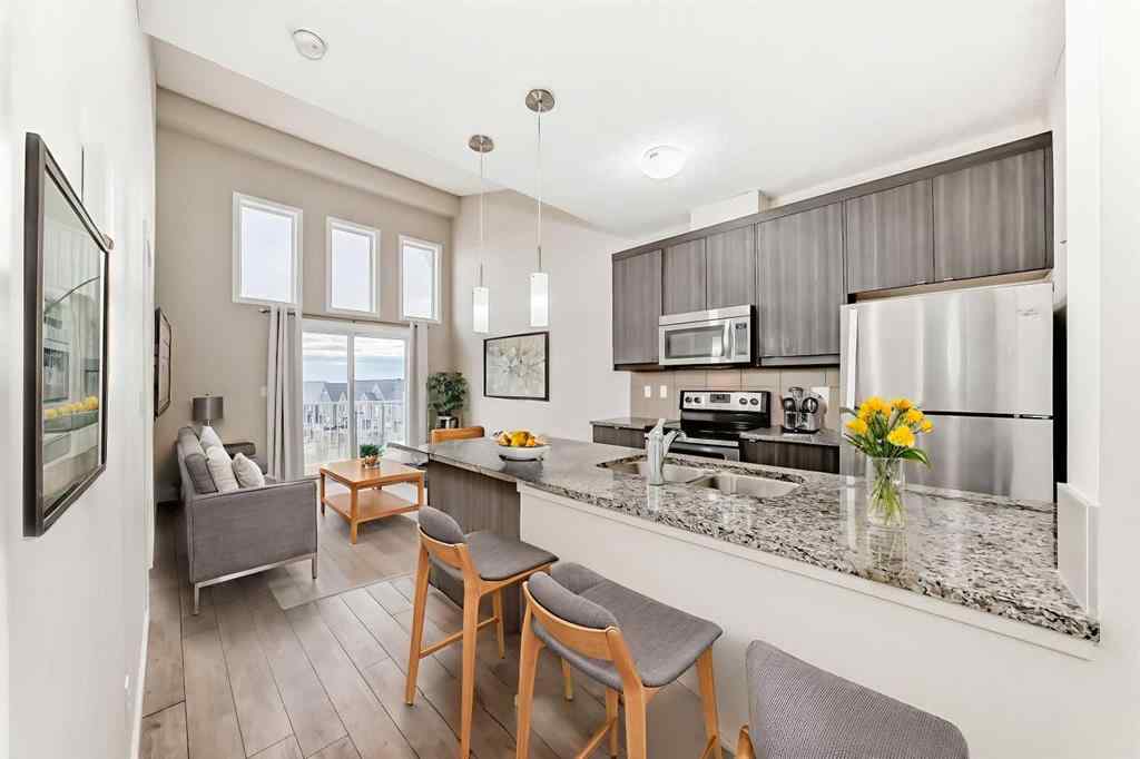 MLS® A2268077 - Unit #415 402 Marquis Lane SE in Mahogany Calgary, Residential