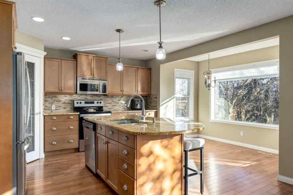 MLS® A2268081 - 1880 Thornbird Road SE in Thorburn Airdrie, Residential