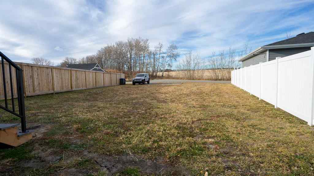 MLS® A2268086 - 103 Gray Close  in Grayhawk Sylvan Lake, Residential