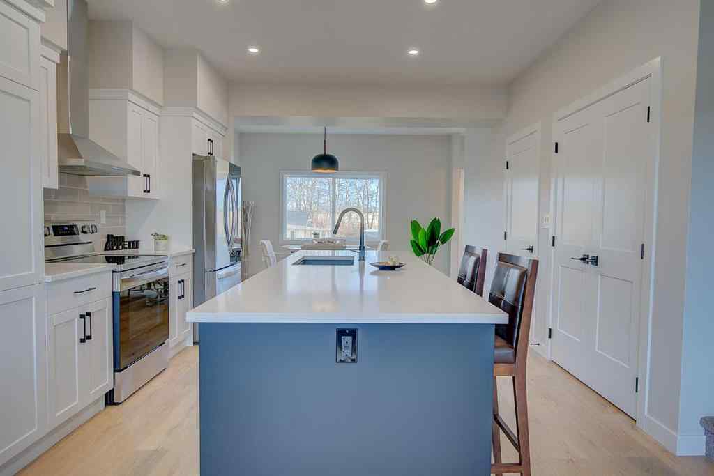 MLS® A2268086 - 103 Gray Close  in Grayhawk Sylvan Lake, Residential