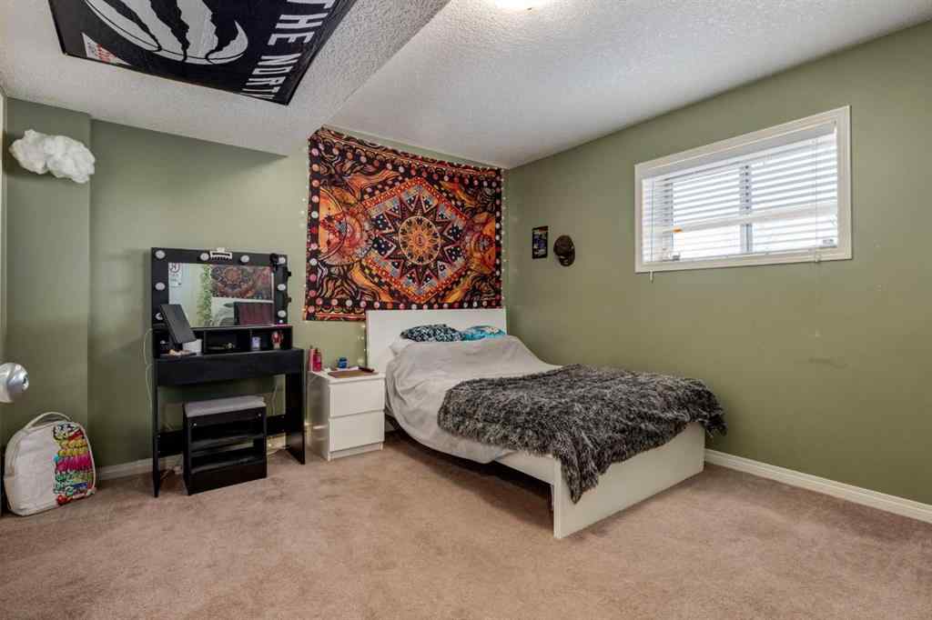 MLS® A2268089 - 569 Boulder Creek Circle SE in Boulder Creek Estates Langdon, Residential