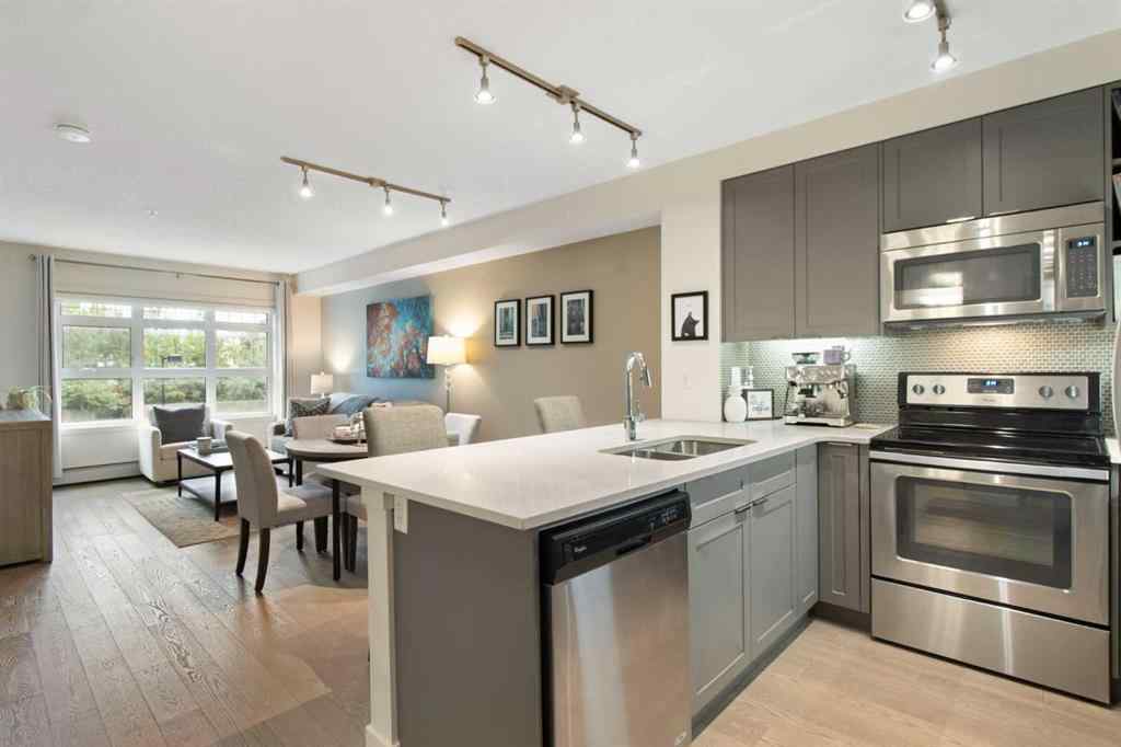 MLS® A2268116 - Unit #128 25 Auburn Meadows Avenue SE in Auburn Bay Calgary, Residential