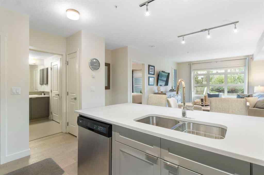 MLS® A2268116 - Unit #128 25 Auburn Meadows Avenue SE in Auburn Bay Calgary, Residential