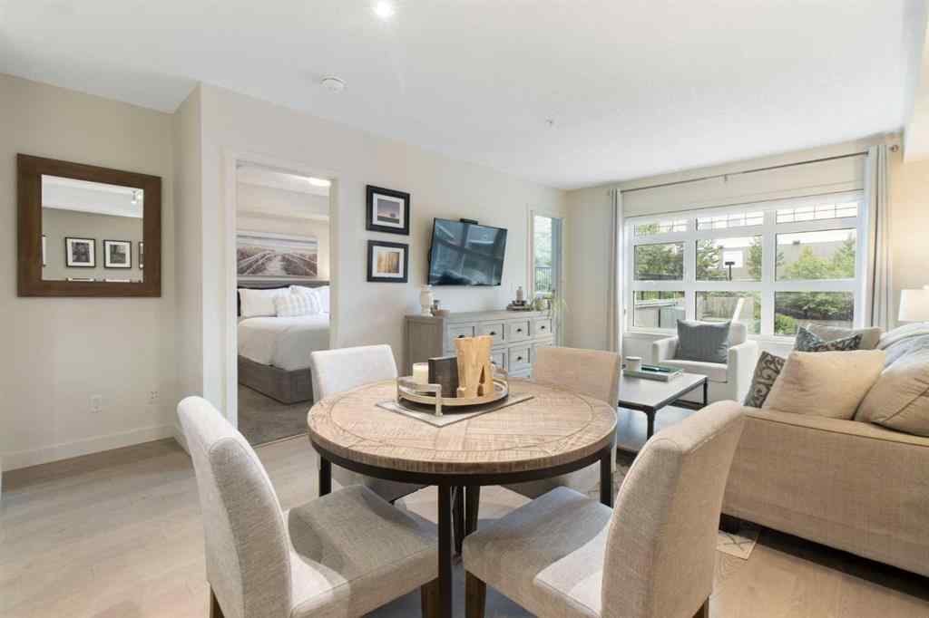 MLS® A2268116 - Unit #128 25 Auburn Meadows Avenue SE in Auburn Bay Calgary, Residential