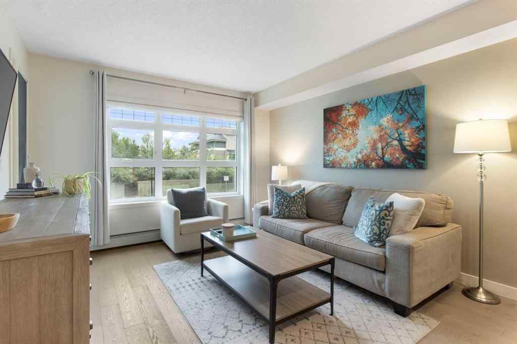 MLS® A2268116 - Unit #128 25 Auburn Meadows Avenue SE in Auburn Bay Calgary, Residential