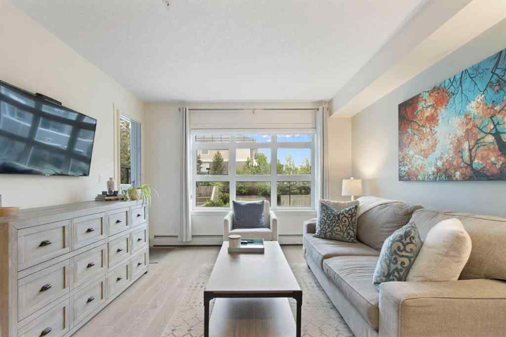 MLS® A2268116 - Unit #128 25 Auburn Meadows Avenue SE in Auburn Bay Calgary, Residential