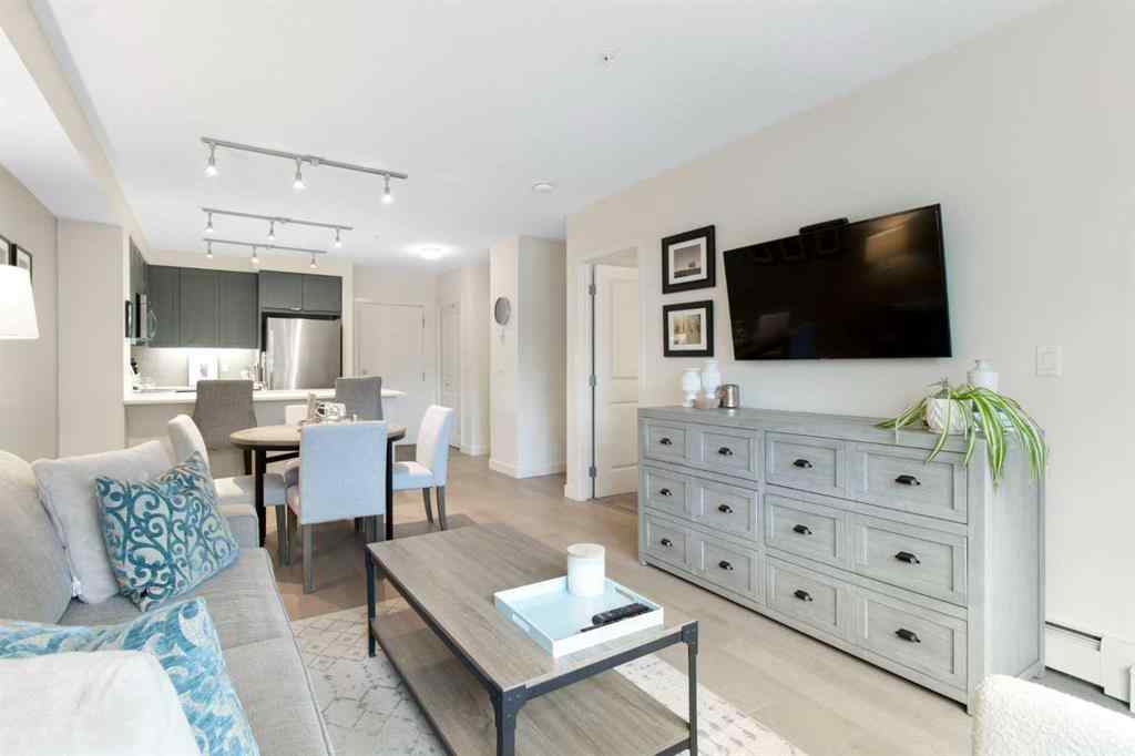 MLS® A2268116 - Unit #128 25 Auburn Meadows Avenue SE in Auburn Bay Calgary, Residential