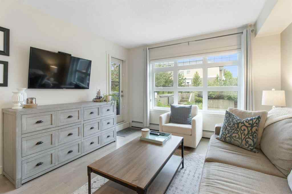 MLS® A2268116 - Unit #128 25 Auburn Meadows Avenue SE in Auburn Bay Calgary, Residential