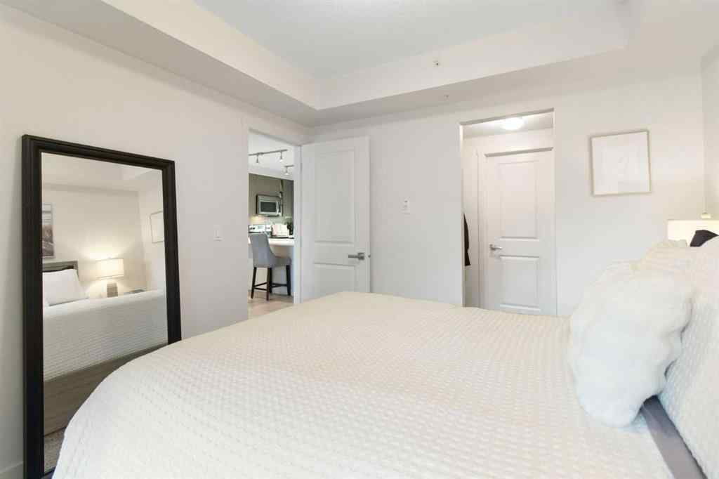 MLS® A2268116 - Unit #128 25 Auburn Meadows Avenue SE in Auburn Bay Calgary, Residential