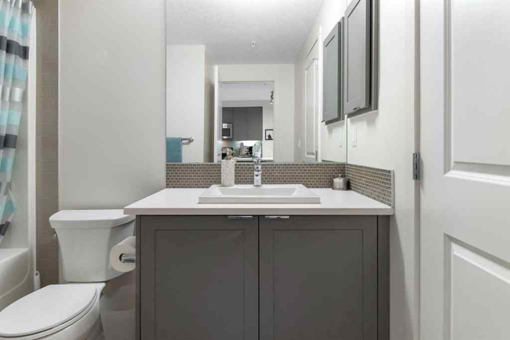MLS® A2268116 - Unit #128 25 Auburn Meadows Avenue SE in Auburn Bay Calgary, Residential