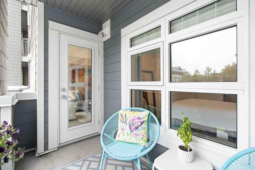 MLS® A2268116 - Unit #128 25 Auburn Meadows Avenue SE in Auburn Bay Calgary, Residential