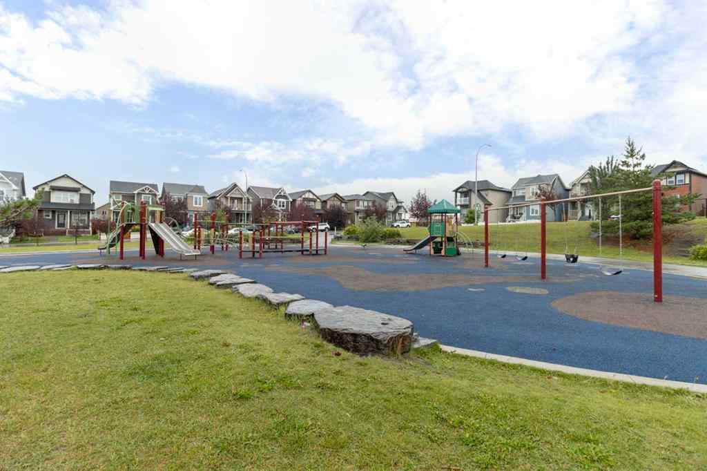 MLS® A2268116 - Unit #128 25 Auburn Meadows Avenue SE in Auburn Bay Calgary, Residential