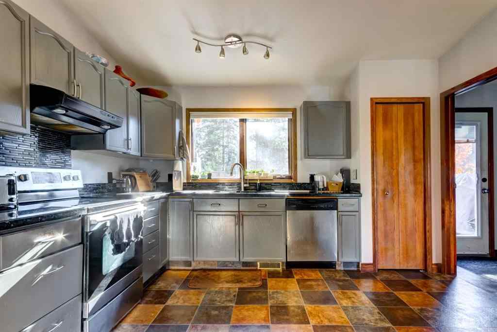 MLS® A2268124 - 303 Pioneer Road  in Cougar Creek Canmore, Residential