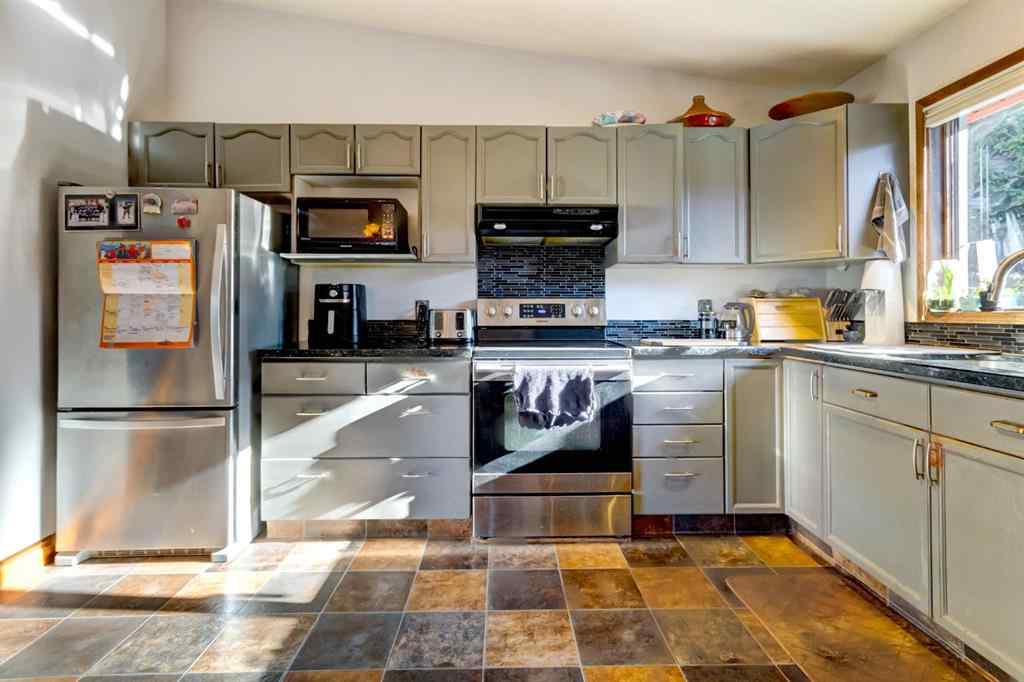 MLS® A2268124 - 303 Pioneer Road  in Cougar Creek Canmore, Residential