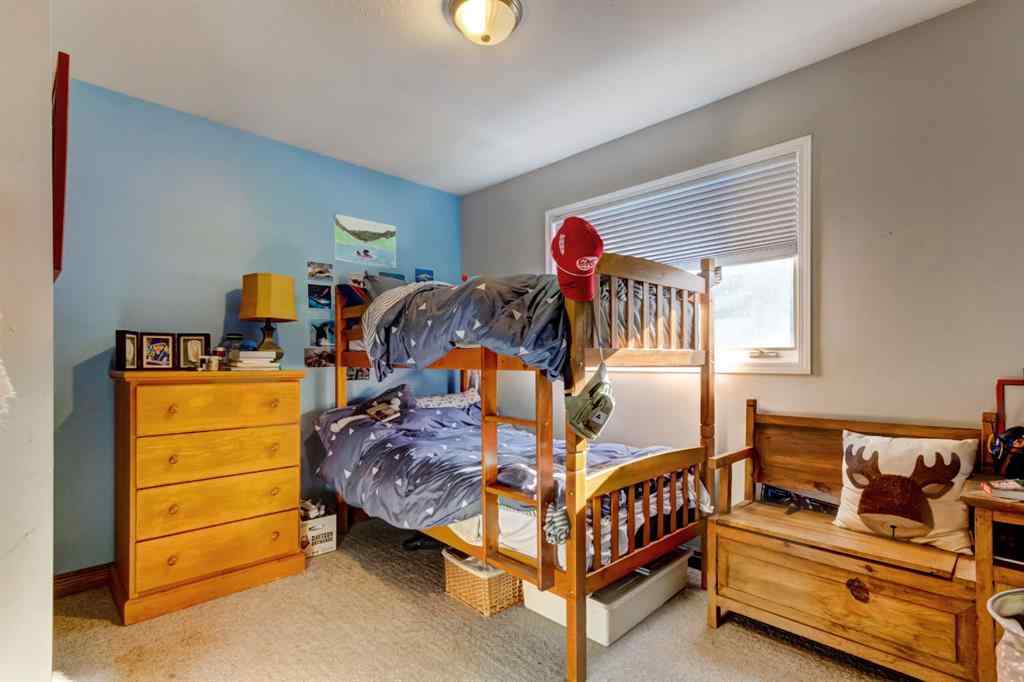 MLS® A2268124 - 303 Pioneer Road  in Cougar Creek Canmore, Residential