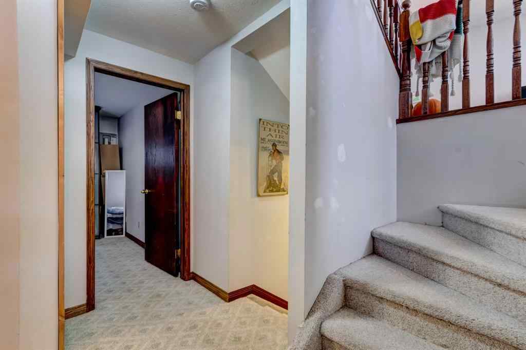 MLS® A2268124 - 303 Pioneer Road  in Cougar Creek Canmore, Residential