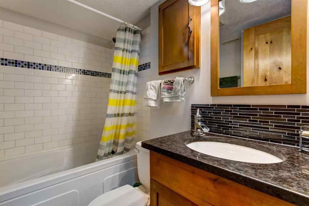 MLS® A2268124 - 303 Pioneer Road  in Cougar Creek Canmore, Residential