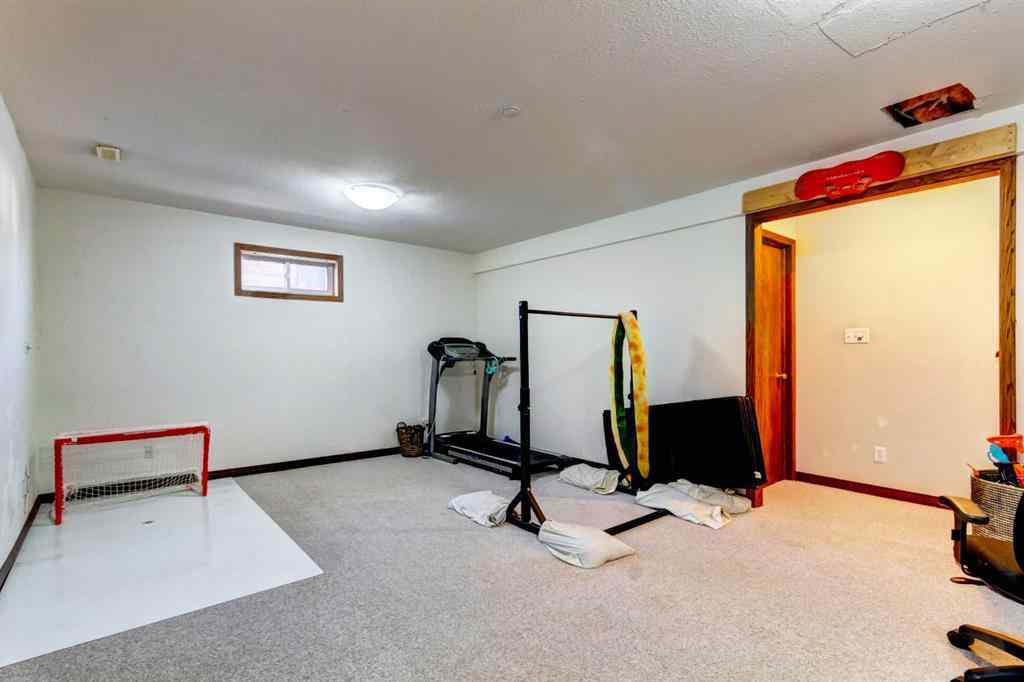 MLS® A2268124 - 303 Pioneer Road  in Cougar Creek Canmore, Residential