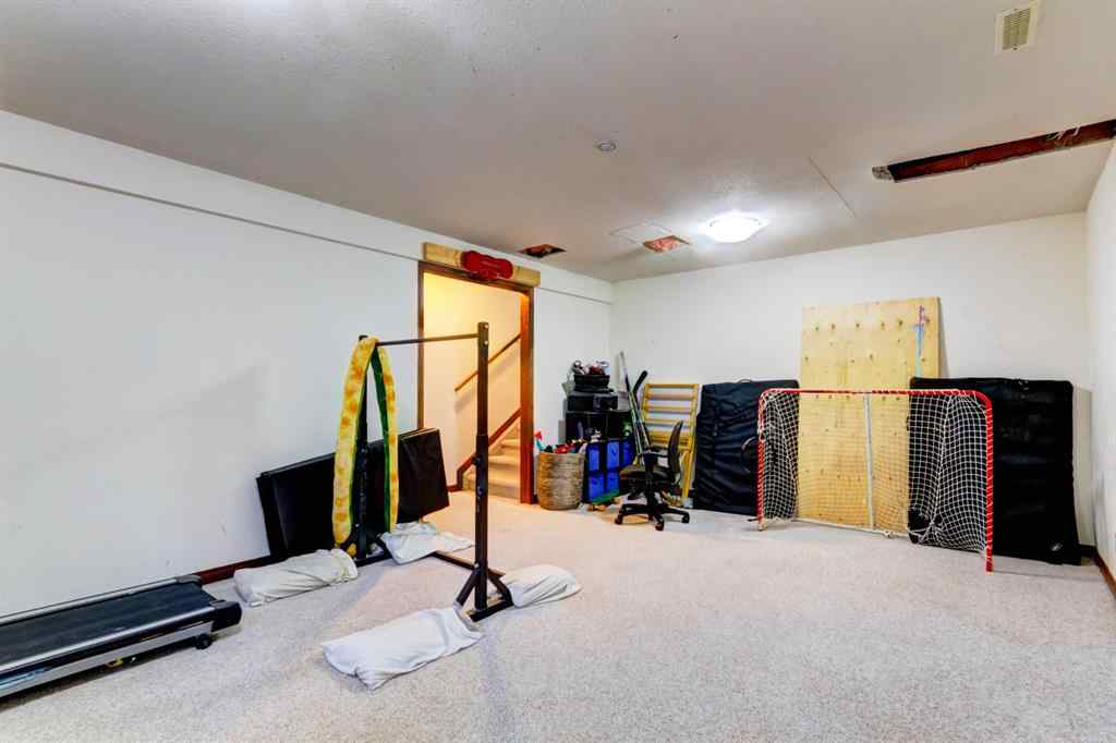 MLS® A2268124 - 303 Pioneer Road  in Cougar Creek Canmore, Residential