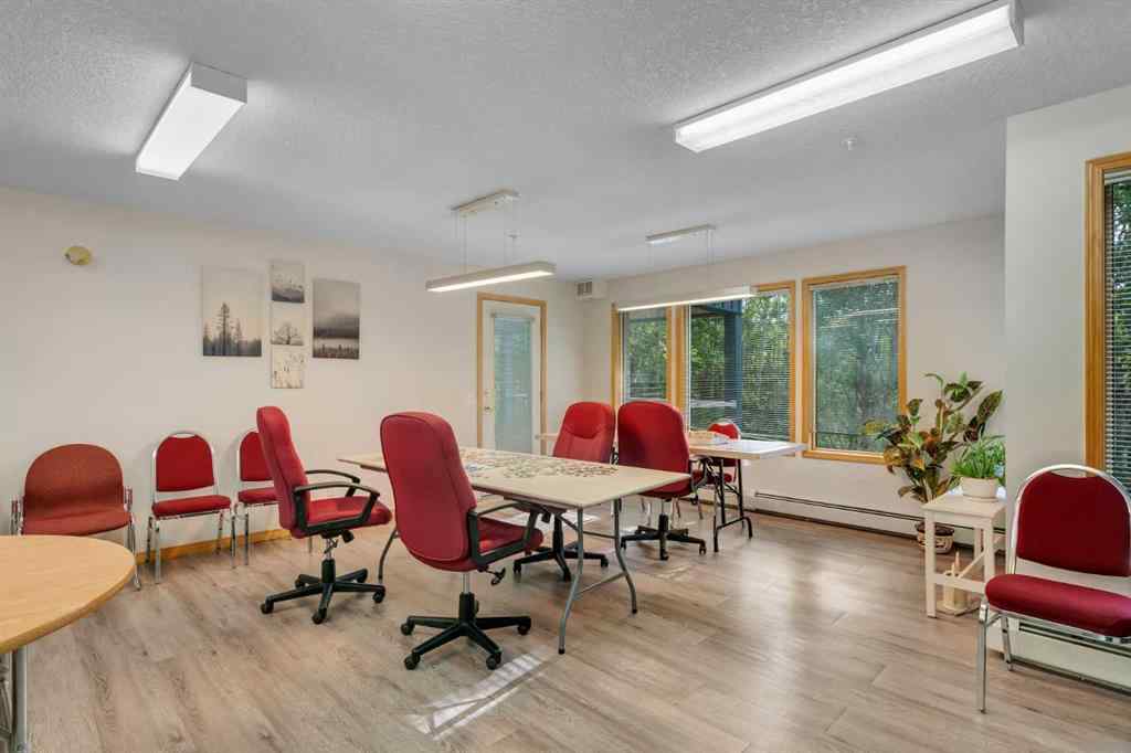 MLS® A2268126 - Unit #122 7229 Sierra Morena Boulevard SW in Signal Hill Calgary, Residential