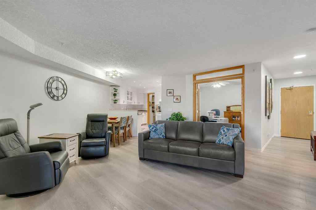 MLS® A2268126 - Unit #122 7229 Sierra Morena Boulevard SW in Signal Hill Calgary, Residential