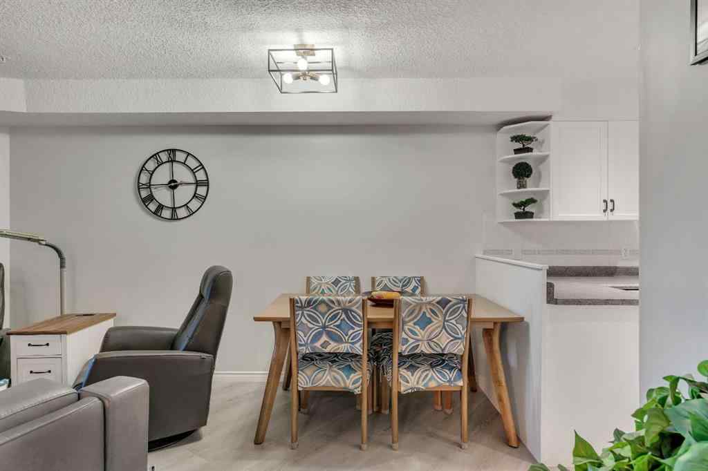 MLS® A2268126 - Unit #122 7229 Sierra Morena Boulevard SW in Signal Hill Calgary, Residential